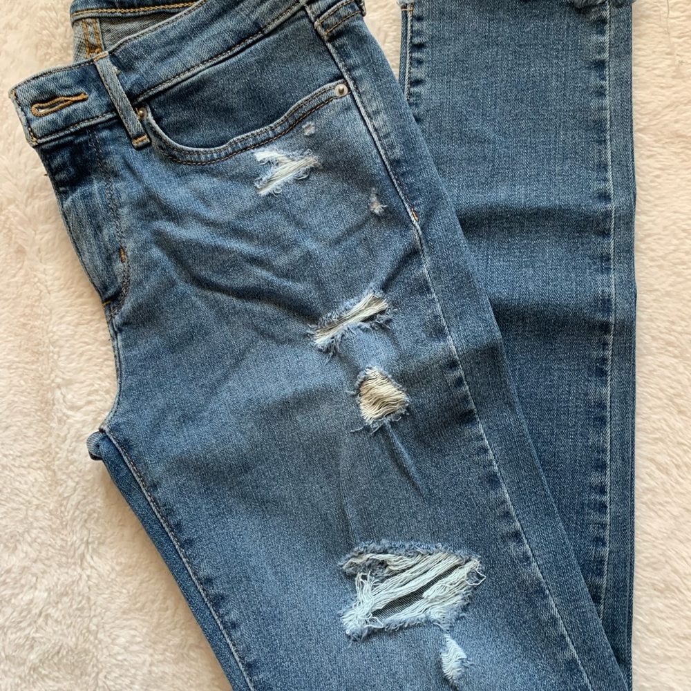 Women's Distressed Blue Jeans